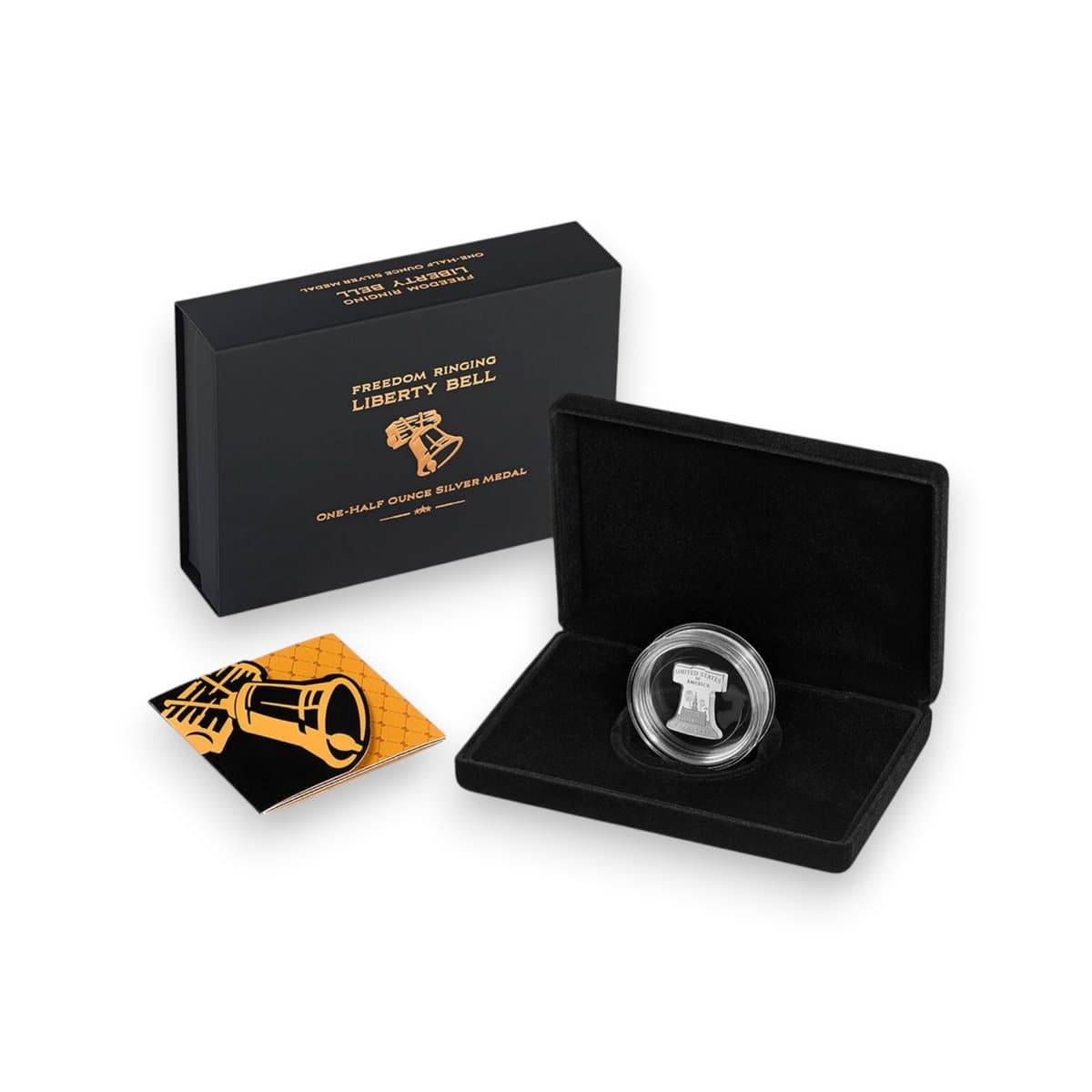 The Freedom Ringing Liberty Bell half-ounce silver medal in its black presentation case, beside its outer box and folder
